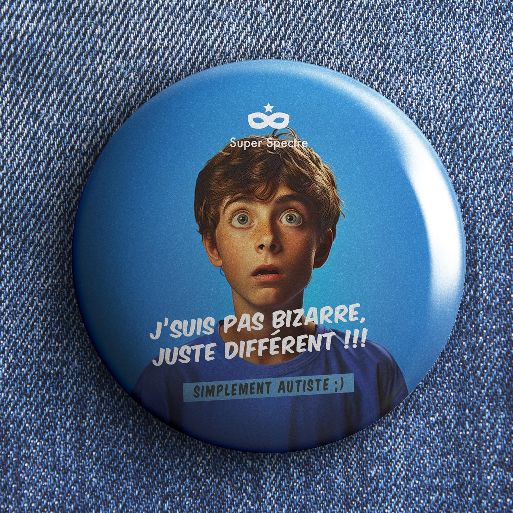 Badge de sensibilisation "J'suis pas bizarre, juste différent !!!" - Ø 75mm